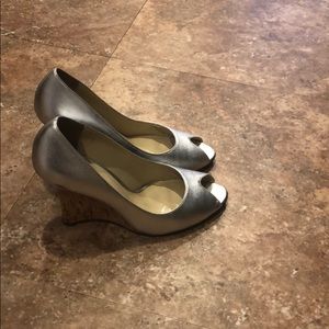 Silver pumps by JLo